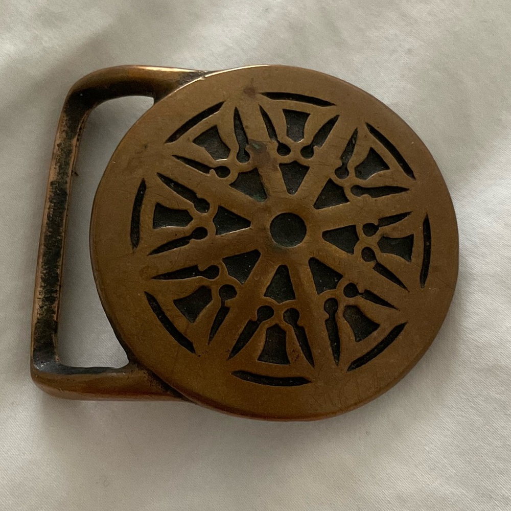 RARE BRASS ‘WHEEL OF LAW’ BELT BUCKLE